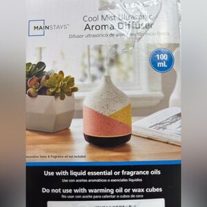 Mainstays 100ml Ultrasonic 100ml Oil Diffuser, Black, orange, yellow and white